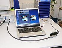 Videoendoskop bei der Begutachtung des Innenlebens eines PC